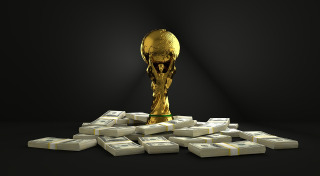 award winner holding trophy